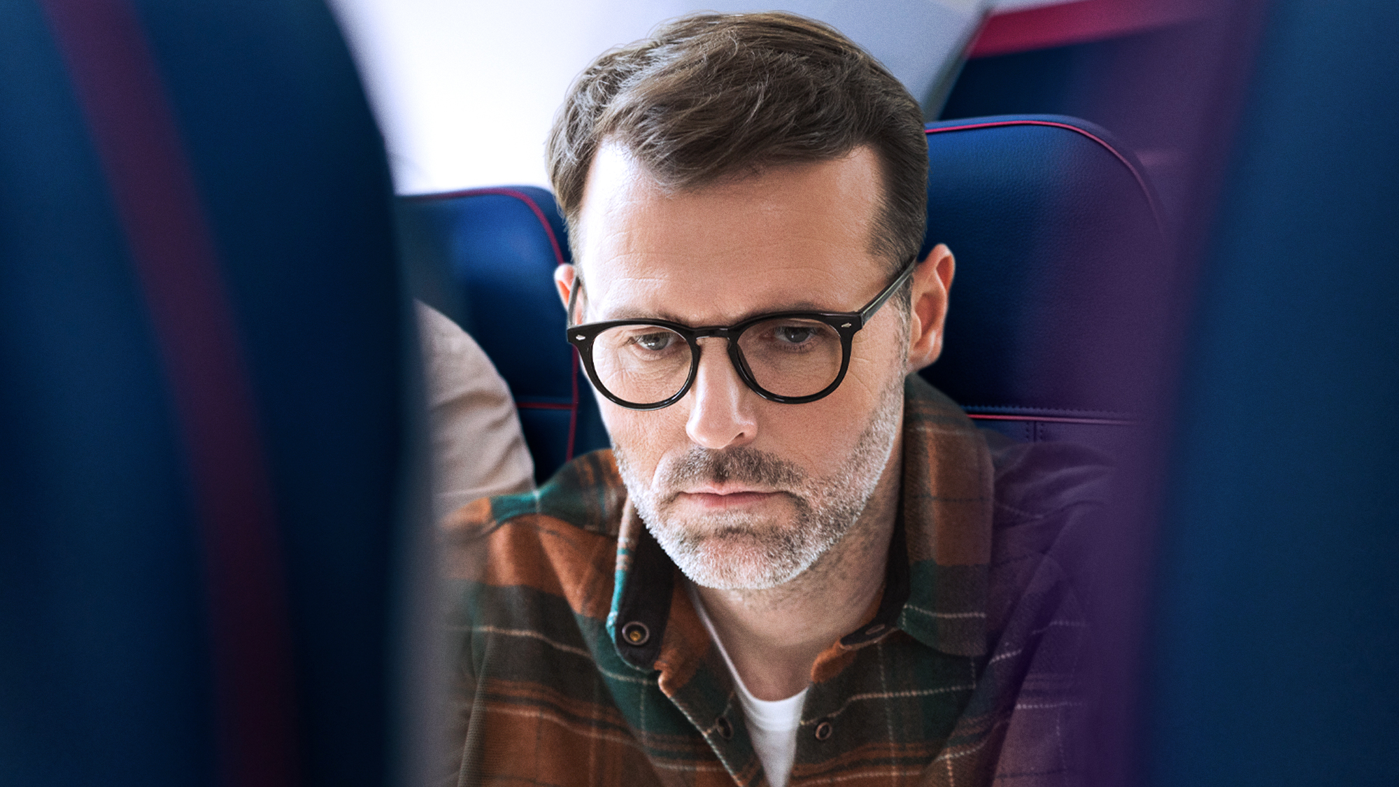Mystery Unfolds Midair as Traveler Becomes Obsessed with Stranger’s ‘War And Peace’