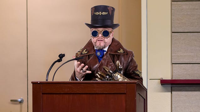 "Time-Traveling Visionary: Man in Steampunk Goggles Makes Extraordinary Case for Segway-Loving Future at City Council!"