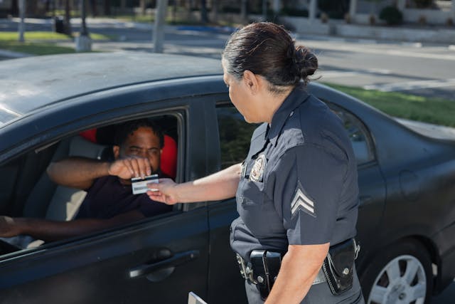 "Police Officers' Mysterious Touch: The Surprising Secret Behind Taillight Taps Revealed!"