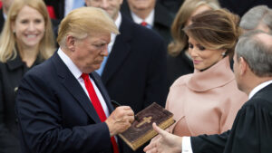 "Trump's Unexpected Move: Autographs Bible at Swearing-In, Leaves Justice Roberts in Shock!"