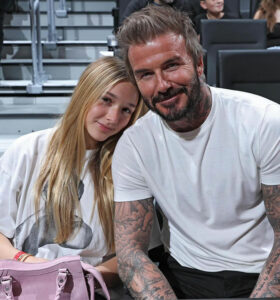 "David Beckham's Shocking Moment: The Kiss That Left Fans Divided Over Parenting Boundaries!"