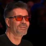 "Unveiling the Mystery: The Surprising Secret Behind Simon Cowell's Red-Tinted Glasses on BGT!"