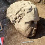 Ancient Rome’s Secrets Unveiled: Mysterious Giant Statue Head Discovered Near Trajan’s Forum!