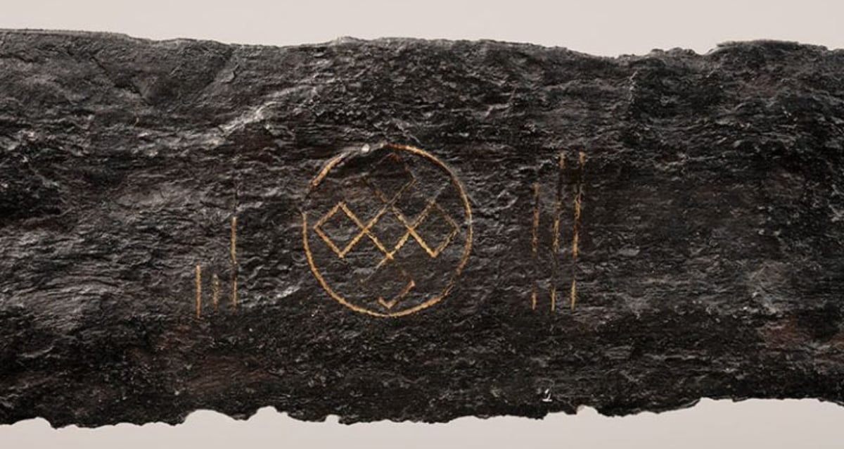 Mystery Unveiled: Medieval Sword with Enigmatic Viking Inscription Discovered Beneath Dutch River