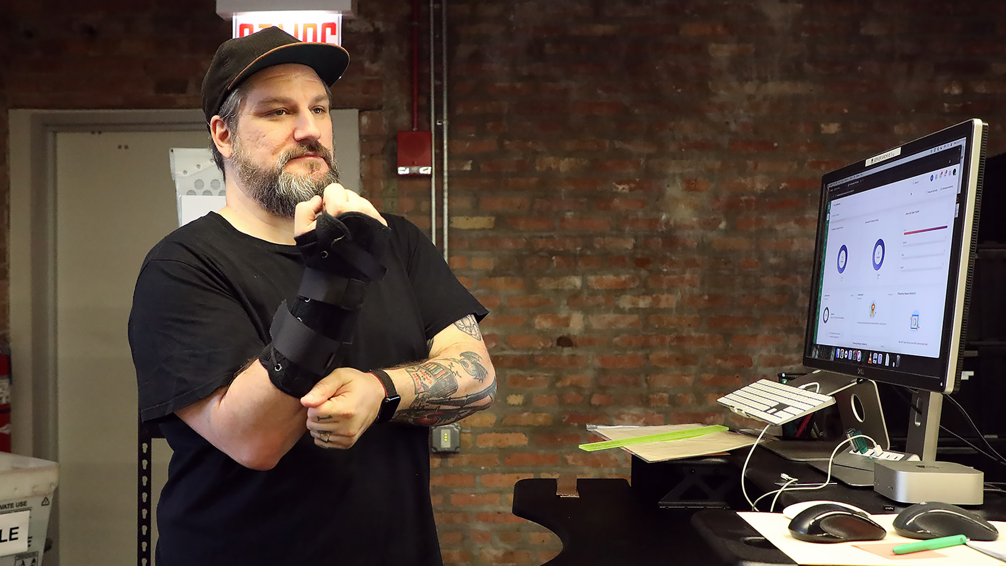 Office Heroic or Hopeless? IT Guy’s Stoic Ritual With Carpal Tunnel Braces Raises Deep Questions