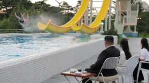 Tourist’s Narrow Escape from Soaking Kim Jong-Un on Waterslide Sparks Intense Drama and Global Curiosity