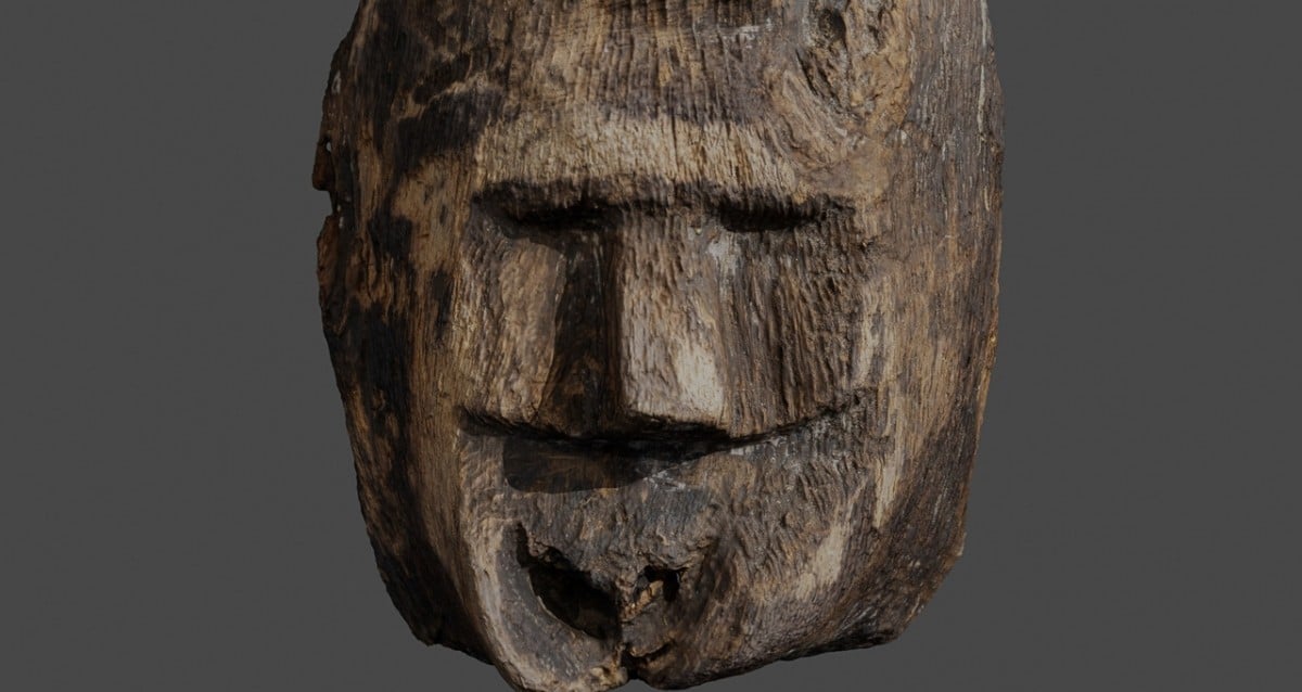 Secrets Beneath the Waves: Mysterious 1,000-Year-Old Human Face Carving Discovered in Polish Lake