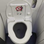 The Shocking Truth Behind Why Airplane Toilets Flush the Way They Do