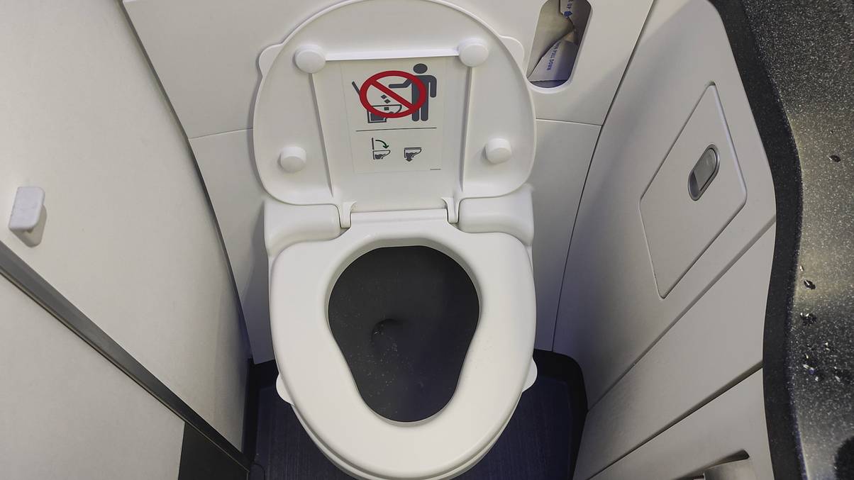 The Shocking Truth Behind Why Airplane Toilets Flush the Way They Do