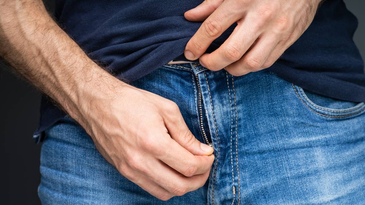 The Surprising Reason Young Men Can’t Seem to Keep Their Hands Out of Their Trousers—Revealed by an Expert