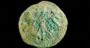 Mystery Unearthed: Ancient Ceramic Pot in Polish Forest Reveals Hundreds of Enigmatic Medieval Coins