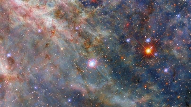 NASA's Hubble Unveils Mysterious Cosmic Tarantula—What Secrets Lie Within Its Glowing Web?