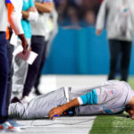 NFL Coach Stuns Crowd by Leading Team While Lying Facedown—What Happened on the Sideline?