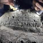 Ancient Runestone Unearthed on Faroe Islands: Could Its Cryptic Inscription Rewrite History?