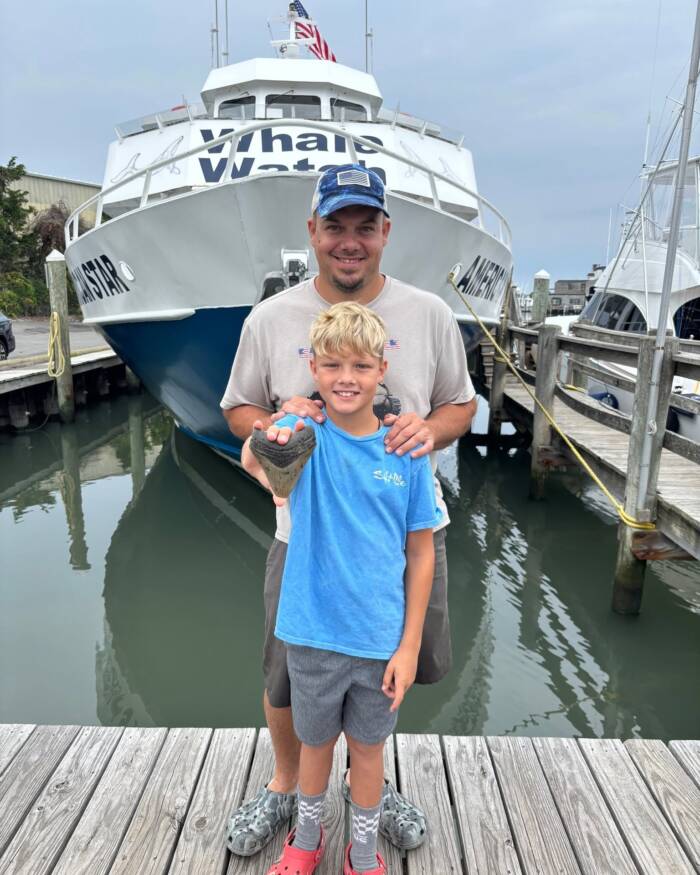 Father and Son Unearth Stunning Megalodon Tooth Hidden Beneath New Jersey Sand for Millions of Years