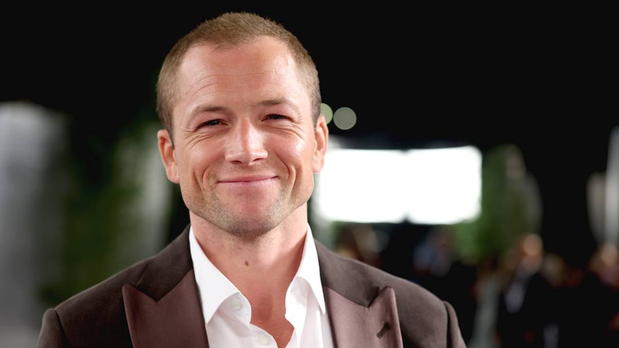 Taron Egerton Spills on the Unplanned On-Set Kiss That Stunned Tom Hardy