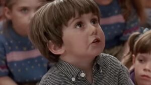 Why the Most Iconic Line from 'Kindergarten Cop' Still Haunts Its Child Star Decades Later