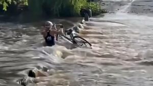 Woman's Narrow Escape from Raging Flood Captured in Heart-Stopping Video
