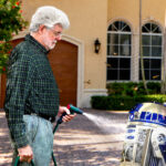 Mystery Emergency: Why Was George Lucas Caught Battling R2-D2 With a Hose Before Museum Unveiling?