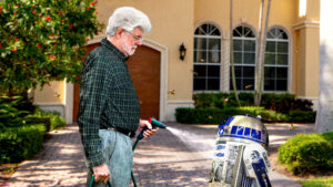 Mystery Emergency: Why Was George Lucas Caught Battling R2-D2 With a Hose Before Museum Unveiling?