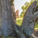 Sydney Sweeney Vanishes Behind Oak Tree—But Her Breasts Mysteriously Resurface Nearby