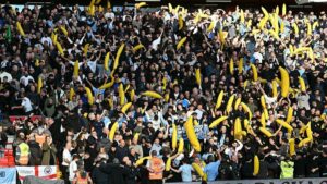 Why Did Man City Fans Bring Bananas to the Stadium After 115 Charges Were Revealed?